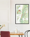 De Long's Wine Map of South America Framed displayed above a dining table with chairs, vase, and glassware.