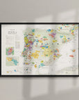 De Long Wine Map of Spain & Portugal Framed, 24x36", with regions and cities, displayed on a wall.