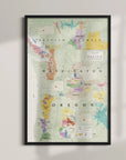 The Wine Map of the Pacific Northwest Framed is displayed on a wall, featuring Oregon, Washington, and part of British Columbia with colorful regional markings and text labels.