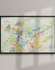 The Wine Map of Austria and Hungary Framed features vibrant regional boundaries and labels, displayed on a light-colored wall with soft shadows enhancing its elegant presentation.