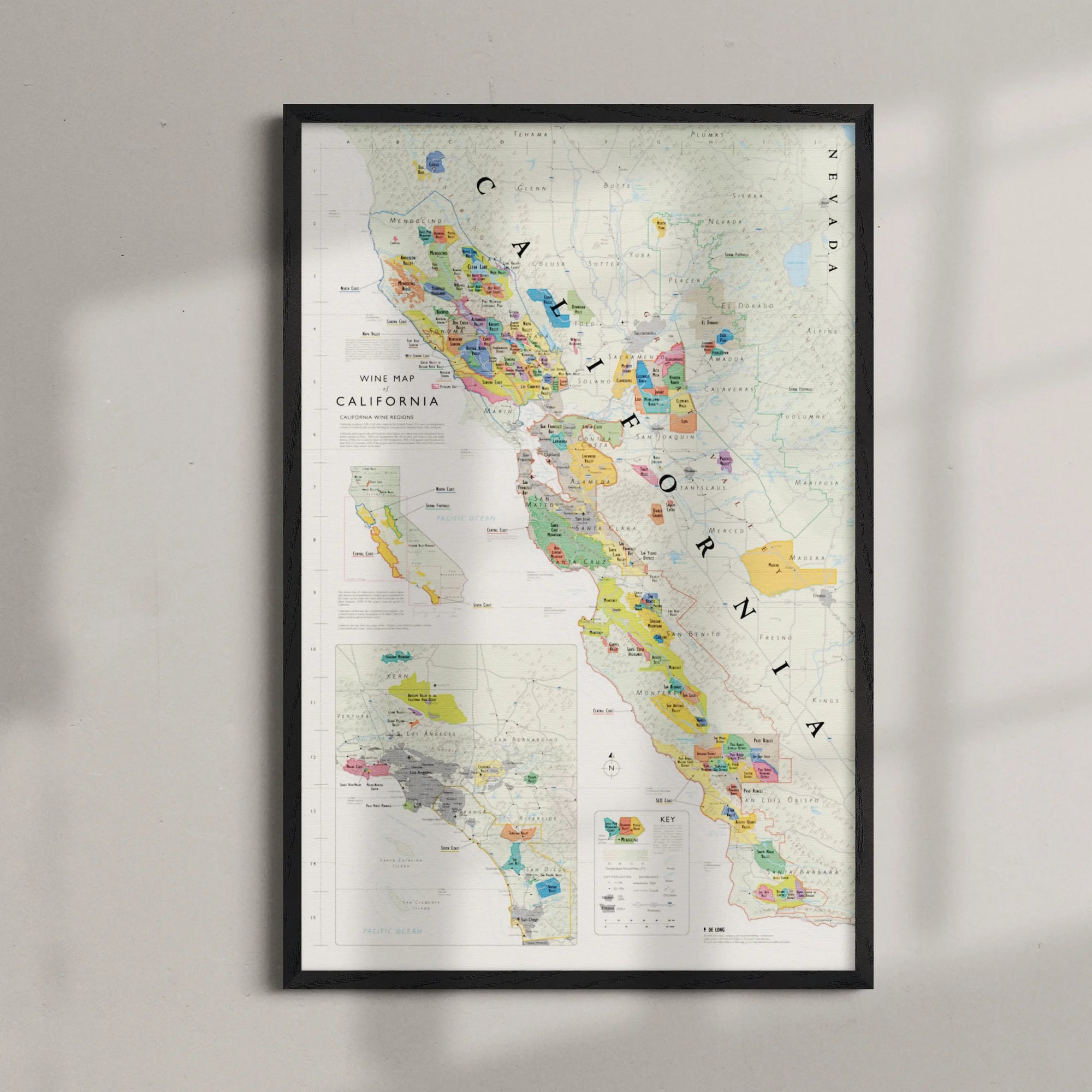 De Long Wine Map of California Framed, 24x36", features colorful regions and inset maps in the bottom left corner.