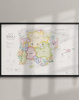 Wine Map of Spain & Portugal IGPs Framed, featuring vividly outlined regions. Sunlight casts gentle shadows on the colorful map as it hangs on a light wall.